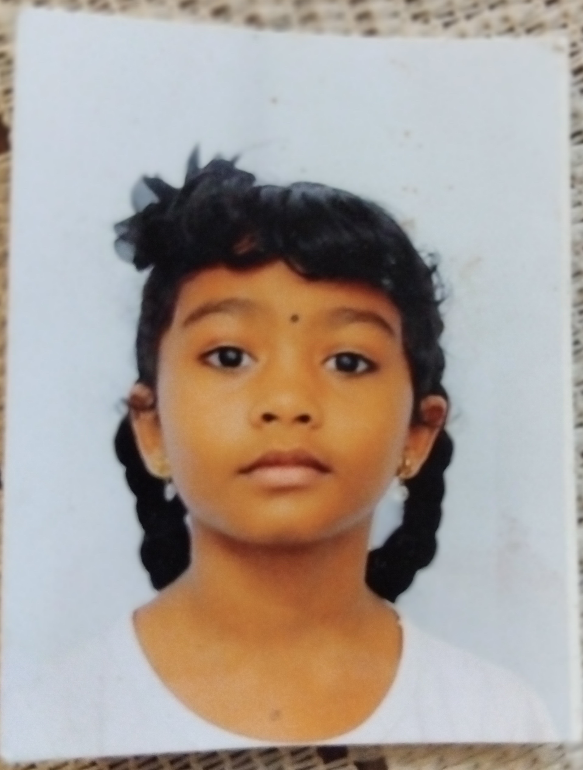 TOSHINI BUNOOMALLY
